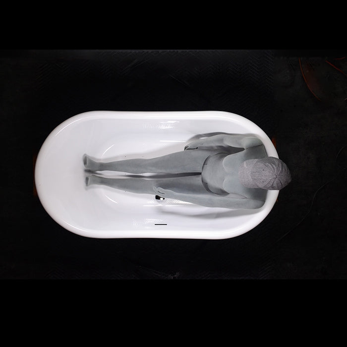 Body height comparison showing a person in 59" x 32" Copper Tub “SanSiro Josephine 59ACHRS” Copper/CoreAcryl Hybrid in Aged Chrome on Copper Finish