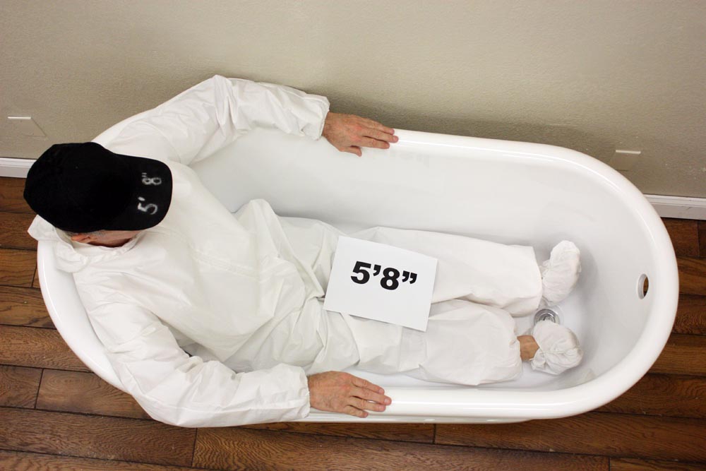 Sizing example showing a 5 foot 8 inch person in this tub