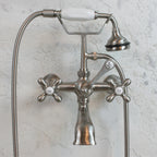 “Victoriana Wall Mount Tub Faucet” in Brushed Nickel