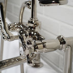 “Victoriana Deck Mount Tub Faucet” in Polished Nickel